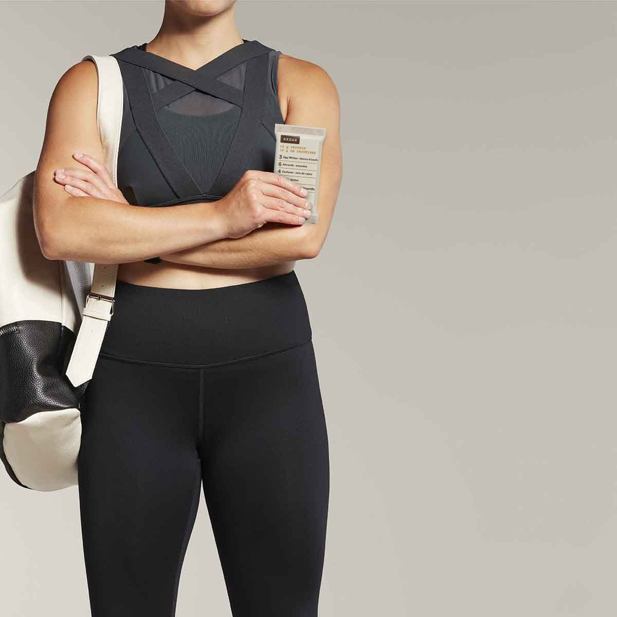 Woman holding RXBAR Coconut Chocolate