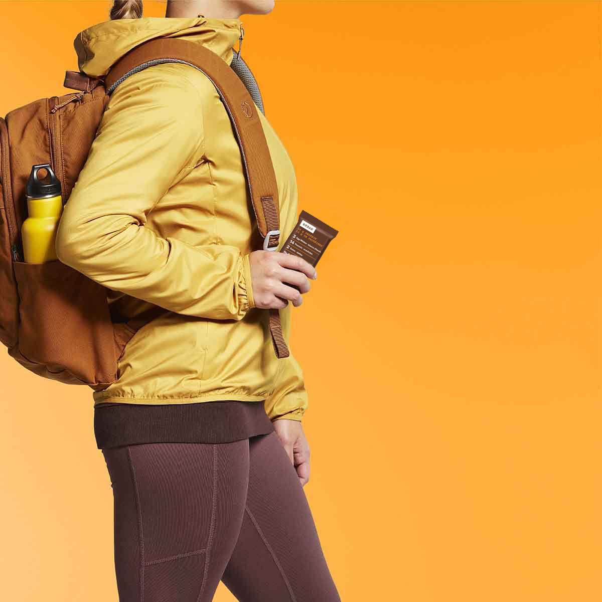 Woman holding RXBAR Peanut Butter Chocolate